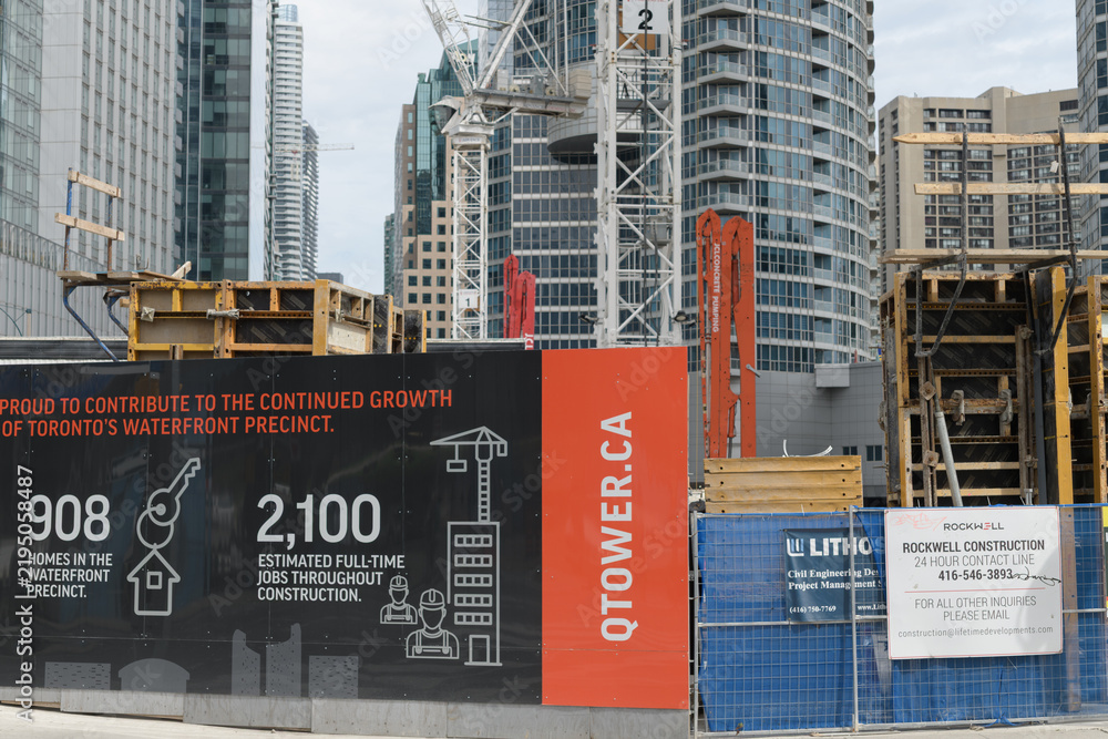 Obraz premium construction site and hoarding at Q Tower development, 200 Queens Quay W/Lower Simcoe St, Toronto