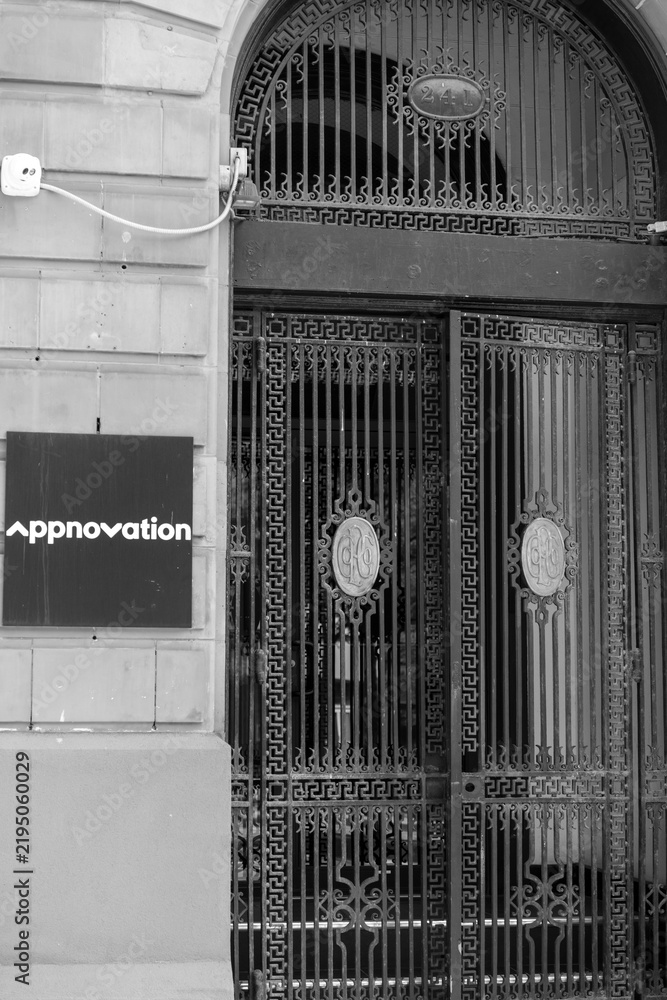 Obraz premium black and white rounded arch portal and sign of Appnovation, a web desiger, located at 241 Spadina Av (built in 1910 as Consolidated Plate Glass Company Building, ), Toronto