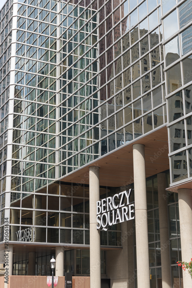 Fototapeta premium exterior building facade and sign of Berczy Square, a business centre, located at 33 Yonge St, Toronto