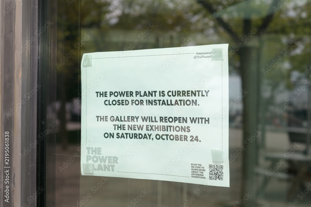 Fototapeta premium glass door of The Power Plant Contemporary Art Gallery with temporarily closed sign located at Harbourfront Centre, 231 Queens Quay W, Toronto