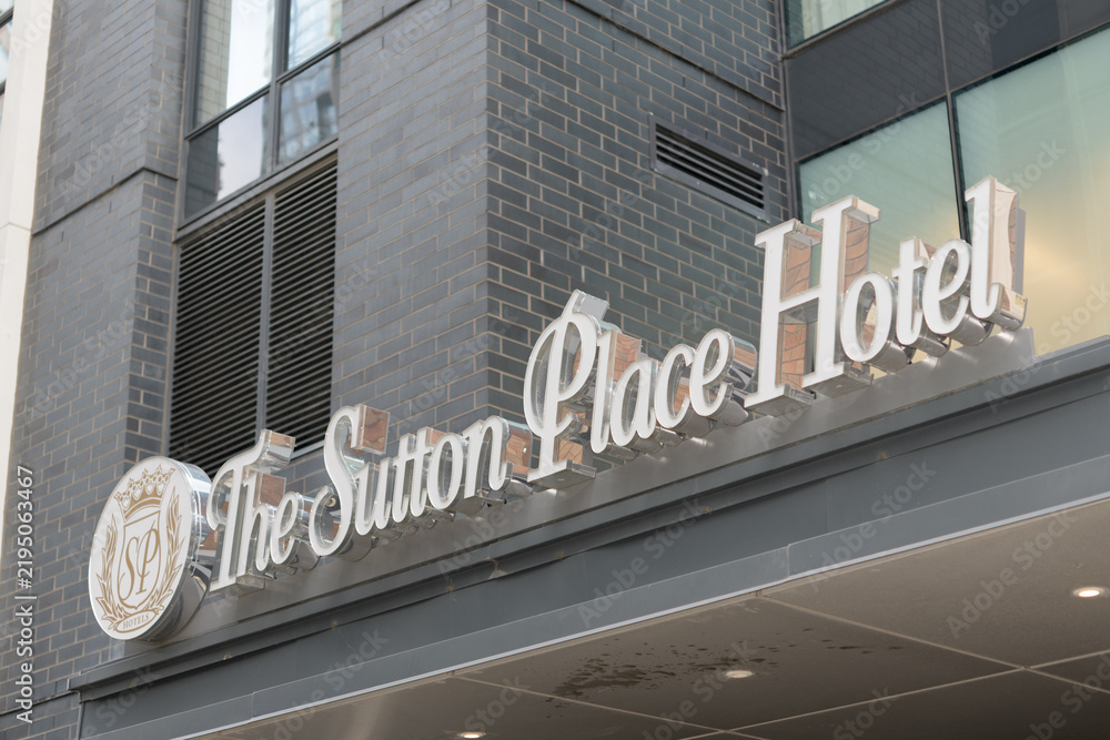 Obraz premium exterior building facade and sign of The Sutton Place Hotel located at 355 King St W (at Blue Jays Way), Entertainment District, Toronto