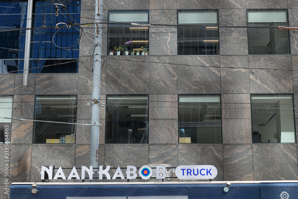 Obraz premium sign atop the Naan & Kabob food truck at a TIFF activation in Toronto (parked in front of 100 University Avenue, an office/commercial building)