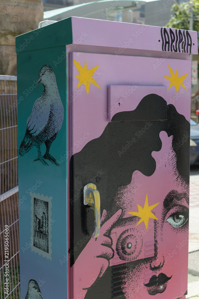 Obraz premium painted traffic control utility box featuring a retro vintage illustration of a lady at Bay St and Albert St in Toronto