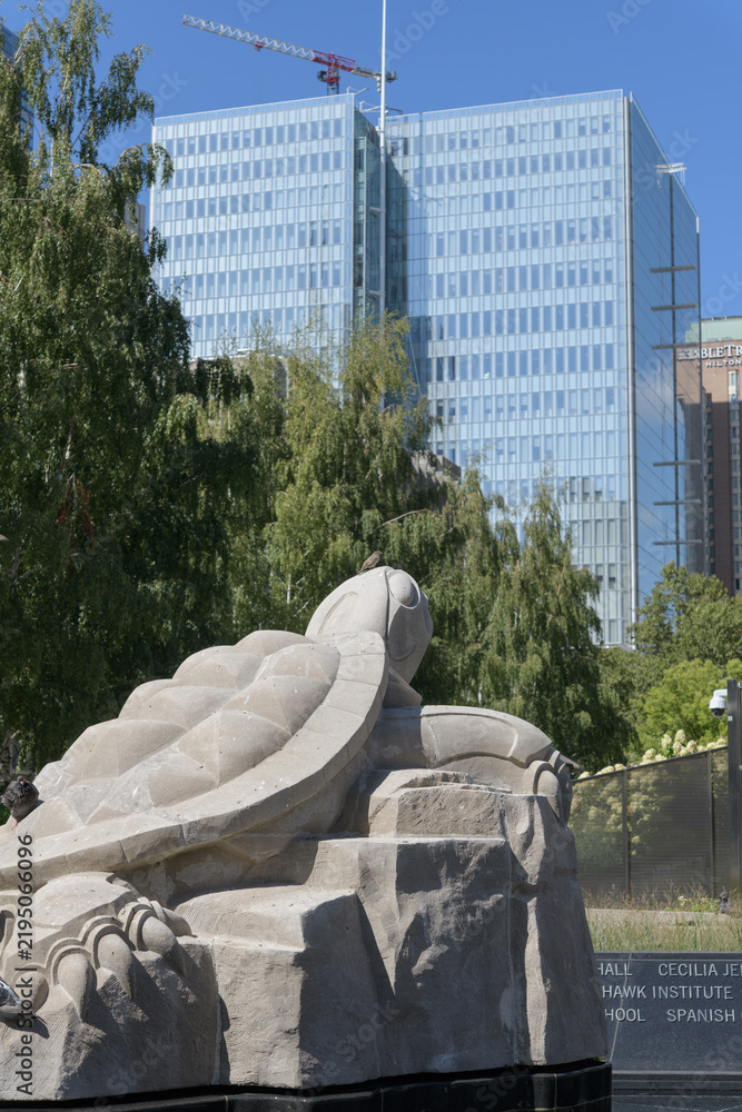 Obraz premium Turtle Sculpture (Turtle Island/Mother Earth), created by Solomon King, an Anishinaabe artist and stonemason from Neyaashiinigmiing First Nation, Spirit Garden, Nathan Phillips Square, Toronto