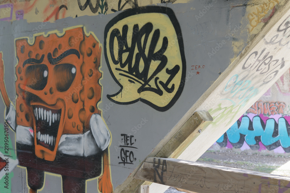 Obraz premium creepy, sharp-toothed SpongeBob graffiti, a local street art found along the Lower Don River Trail in Toronto