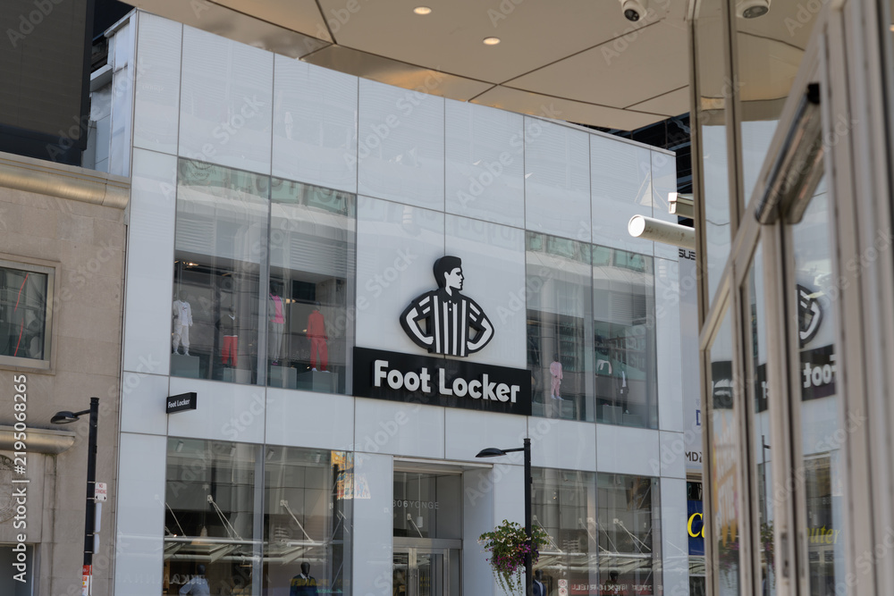 Obraz premium exterior building facade and sign of Foot Locker, a shoe store, located at 306 Yonge St, Toronto