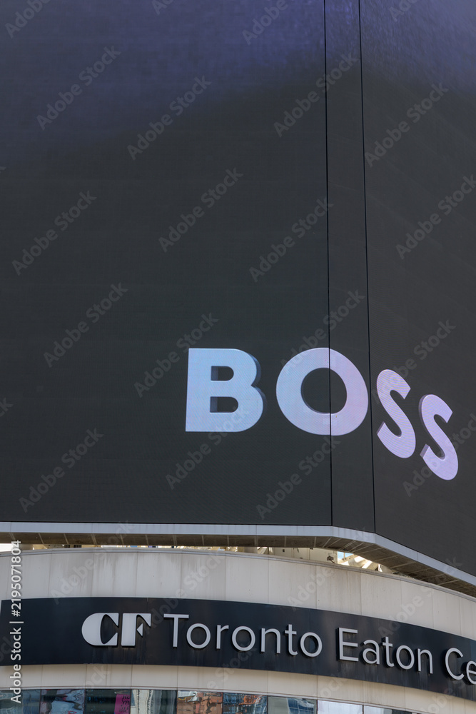 Obraz premium large-format rooftop digital spectacular with advertising by fashion house Hugo Boss, Sankofa Square, Toronto
