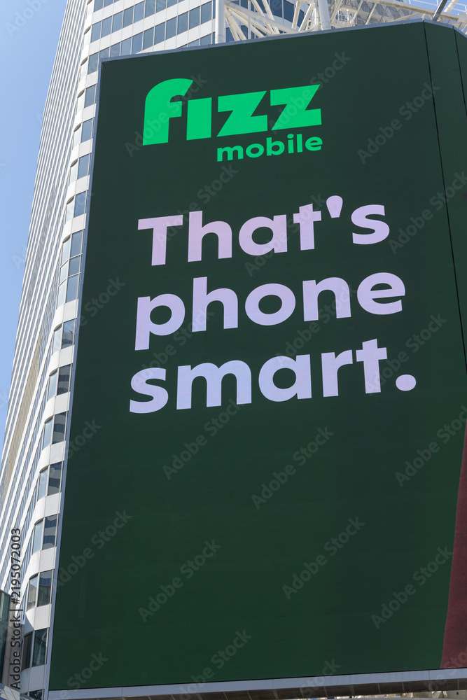 Obraz premium digital spectacular featuring advertisement by Fizz Mobile (Freedom Mobile) facing Sankofa Square, Toronto