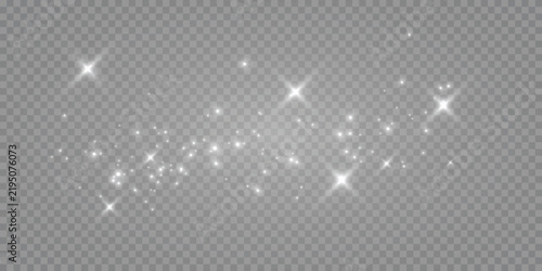 The dust sparks and golden stars shine with special light. Vector sparkles on a transparent background. Christmas lights