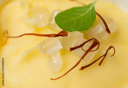 Close up of white bowl of 'Makhan misri' or butter candy to laddu Gopal, a Hindu god lord Krishna during the Janmashtami festival.
