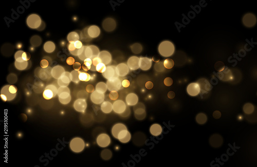 Foto Soft golden bokeh creates a warm glowing effect across a dark background