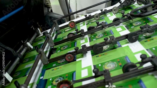 Printed Labels Moving Through Printing Press