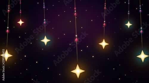 Hanging stars glowing on dark night background