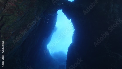 cave diving underwater  ocean scenery sun beams and rays background