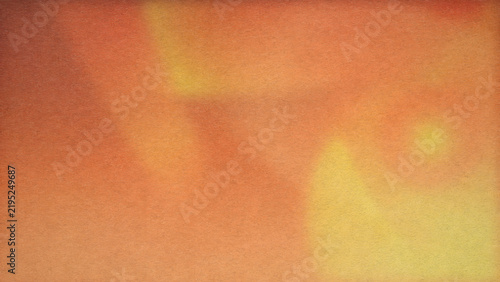 Abstract textured background in warm orange, yellow, and brown tones, featuring a subtle vintage gradient effect
