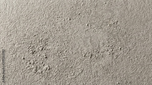 Cuadro en lienzo Textured plaster wall displays a rough uneven surface with subtle tonal variatio