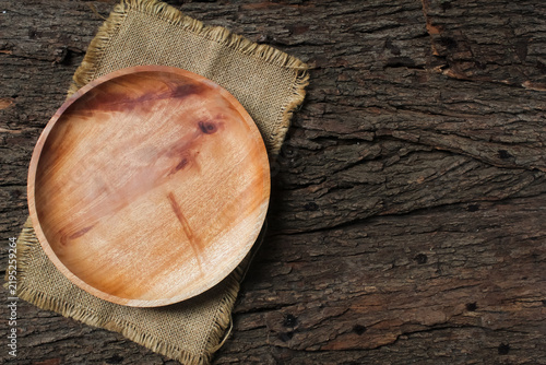 an empty plate on a wooden table with copy space. Food background. 