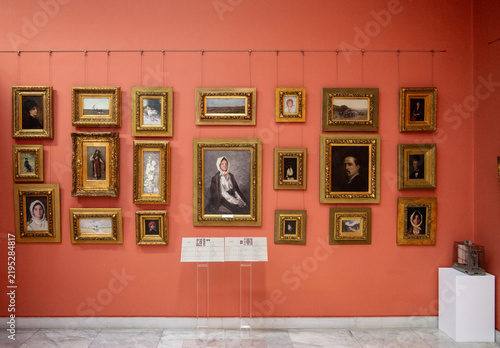 Obraz na płótnie Bucarest, Romania - 6 Nov 25: Gallery Wall of Framed Paintings in Bucharest