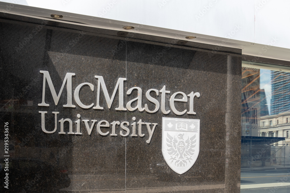 Obraz premium Toronto, Ontario, Canada - September 16, 2026: A exterior signage on the building at McMaster University's Toronto Campus on Bloor Street West in Toronto, Ontario, Canada. 