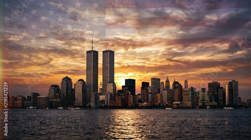 New York City skyline at sunset with a faded American flag overlay concept.