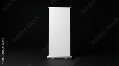 Blank white roll up banner stand isolated on a black background