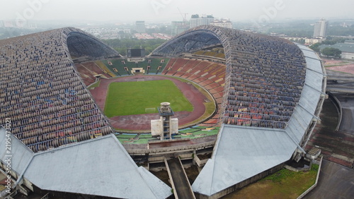 Obraz na płótnie SHAH ALAM, MALAYSIA - OCTOBER 2023: Aerial perspective of Shah Alam Stadium showing the dilapidated translucent roof and empty stands
