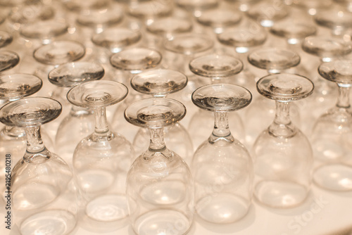 Many Clean washed Clear Wine Glass cups stacked 