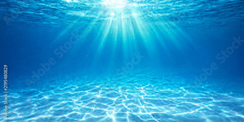 Underwater World Background with Sun Rays, Clear Blue Ocean Water, Soft Light Reflection, Rippled Surface Texture, Abstract Aquatic Scene for Summer and Nature Design