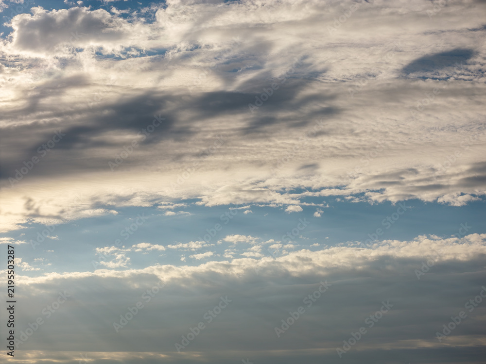 Fototapeta premium Blue sky with fluffy white cumulus clouds on a clear day