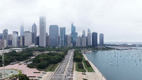 Aerial Drone View of Chicago Skyline and Lake Shore Drive on a Foggy Overcast Day”