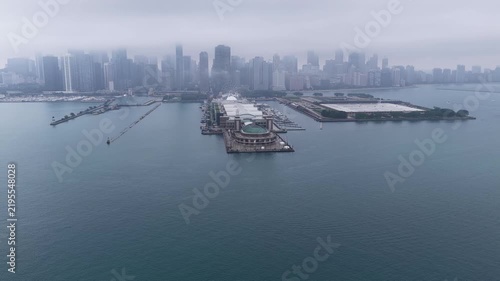 Aerial View of Navy Pier and Chicago Skyline Under Foggy Sky”