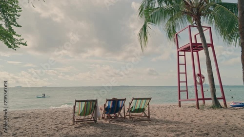 Red Lifeguard Tower and Beach Chairs on Tropical Sand Beach in Summer, 4K Video