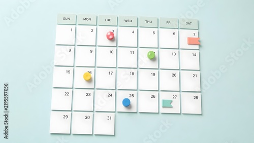 Monthly Calendar Planning And Scheduling Concept With Colorful Pins And Flags