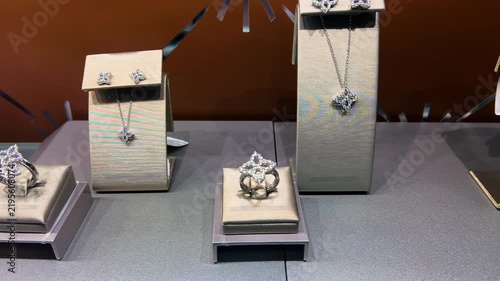 Jewelry Boutique Window Display Pan Shot Left to Right | Diamond Rings, Earrings and Necklace on Showcase Stands | Luxury Store Exhibition