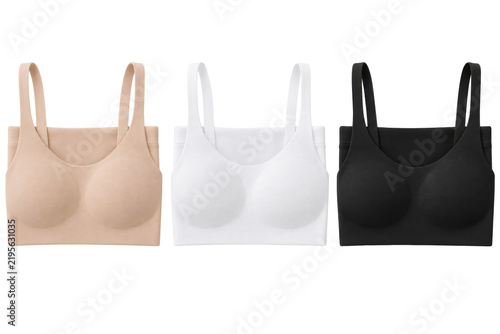 Women's seamless camisole bra three-pack, stretch microfiber, nude beige, white and black, wide straps and smooth molded cups. Flat lay isolated on white background for lingerie retail.