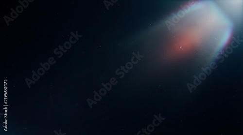 Ethereal cosmic cloud formation with soft glowing hues and faint starlight in deep space