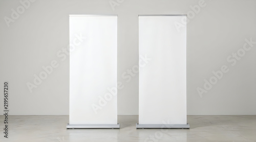 Two roll up banners standing side by side in studio