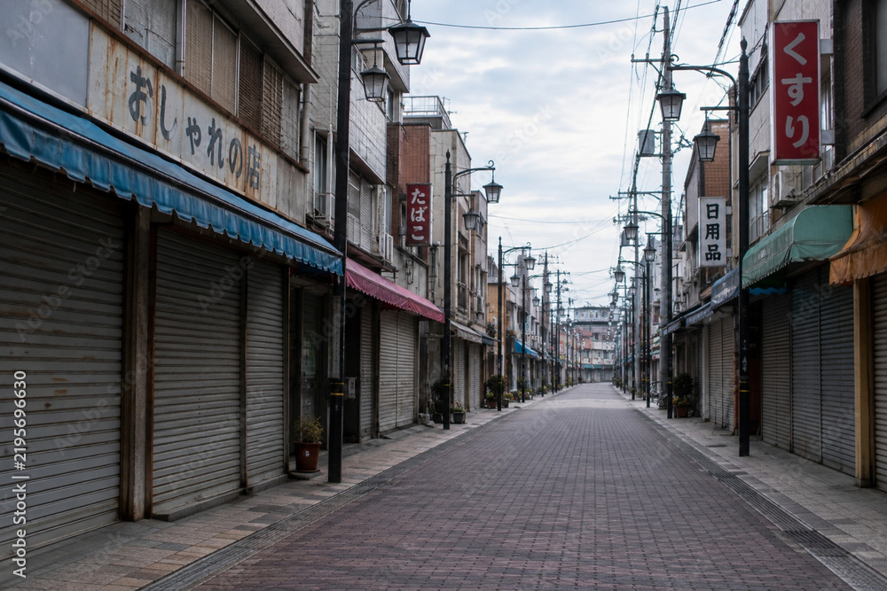 Fototapeta premium A shuttered shopping street in Japan