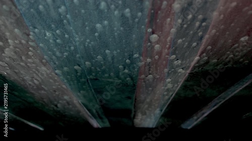 POV from Inside a Car Driving Through an Automatic Car Wash Tunnel with Soap and Brushes