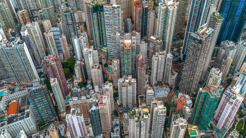 Фотография Densely clustered skyscrapers seen from a high angle in Hong Kong