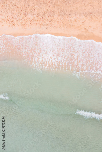 Sea waves and beach aerial view, natural background.