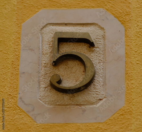 House number plate 5 close-up, Italy