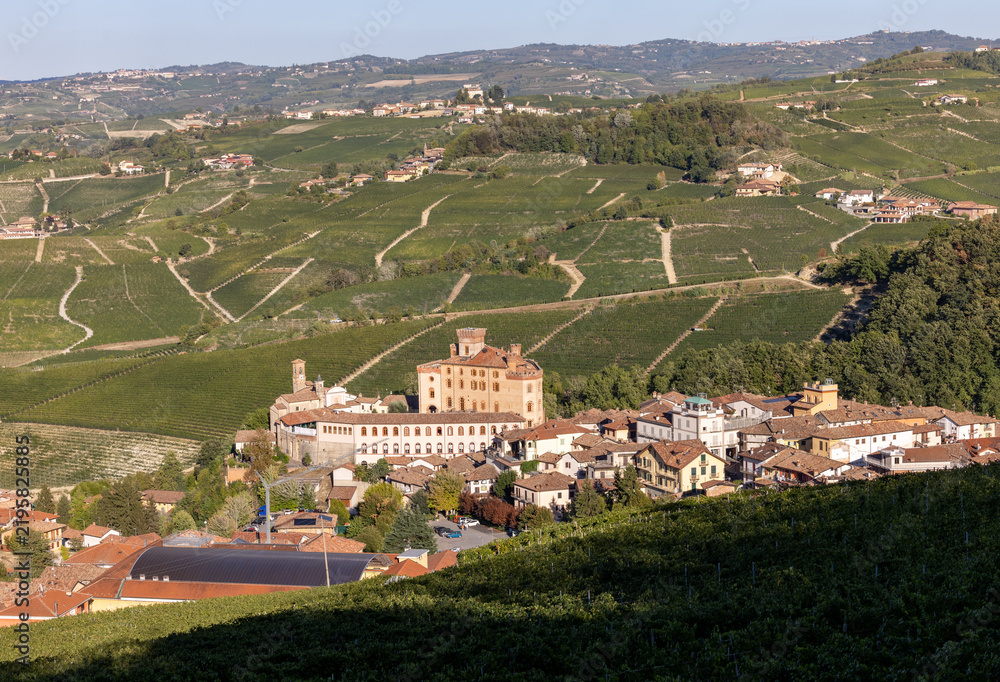 Fototapeta premium The town of Barolo, with the Falletti castle, surrounded by vineyards in Langhe region. Piedmont, Italy