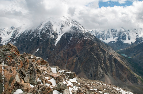 Landscape view of picturesque snow-covered Altai mountain chains seen from the peak of Pyramid mount, Russian Federation, the Altai Republic