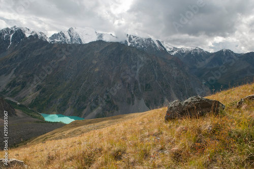 Landscape view of picturesque Altai mountain chains and the Lower Shavlinsky lake down the valley, the Altai Republic, Russia