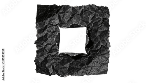 Square hole torn in crumpled black paper, isolated on transparent background