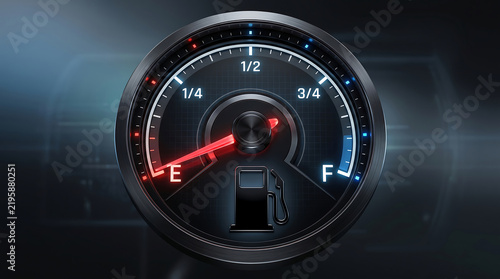 A close up view of a vehicle fuel gauge showing the red indicator needle pointing at empty