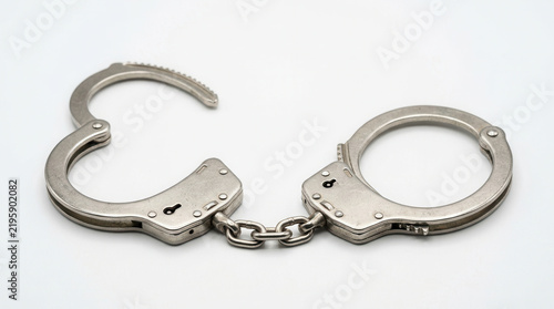 Isolated Handcuffs Symbolizing Justice And Law Enforcement