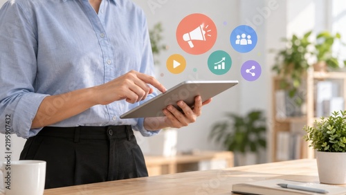 Business professional using tablet for digital marketing strategy management and growth analysis concepts.