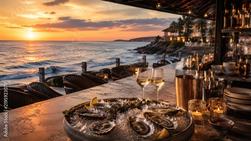 Romantic seafood dinner overlooking sunset ocean shore